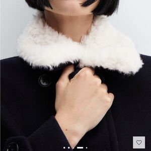 Double breasted coat with fur-effect collar